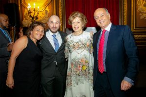 Dr. Legato stands with three people during the 2019 Gala