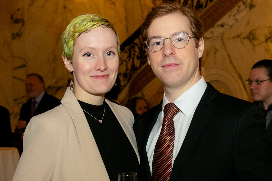 Two people stand side by side for a photo at the 2019 Gala