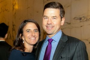 A smiling man and woman facing the camera at the 2019 Gala Event