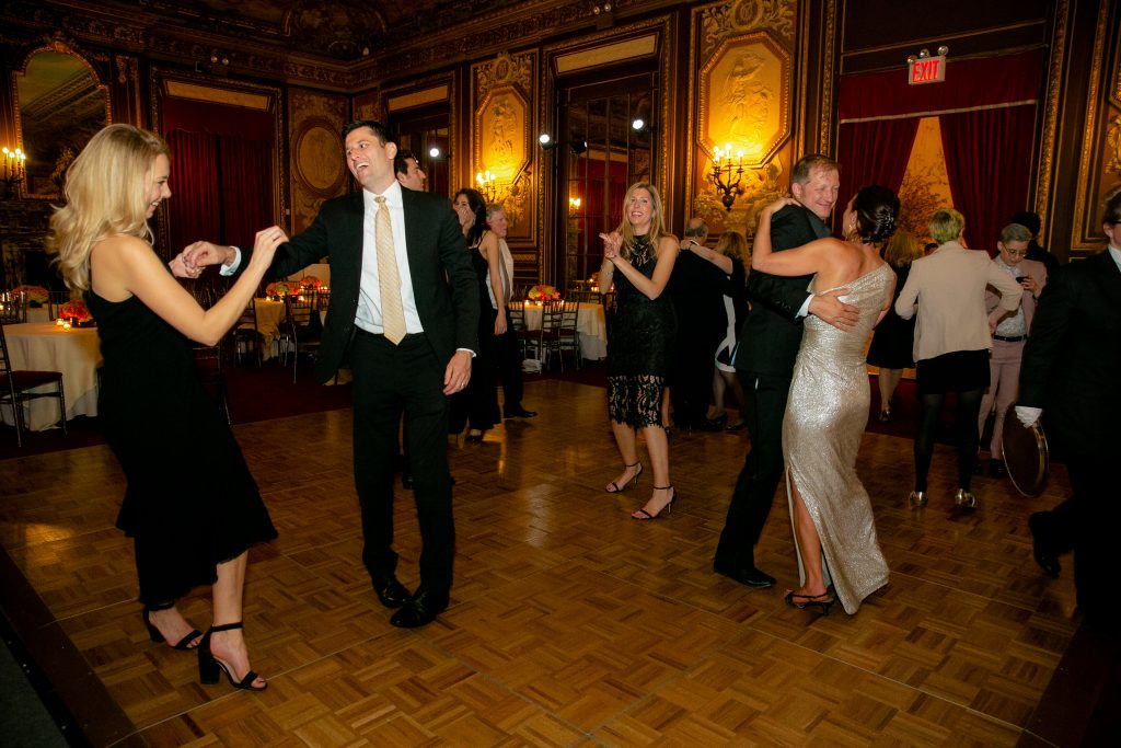 Guests Dancing together in Ballroom - The Foundation For Gender