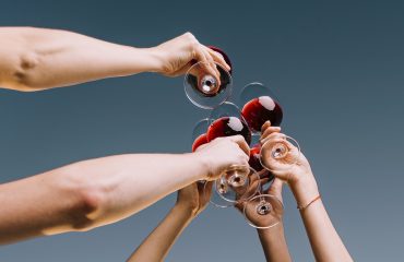 People hands with wine glasses