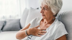 women suffering from chest pain